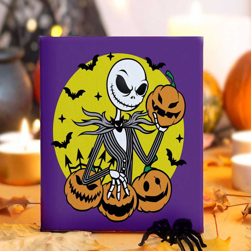 Jack Skellington Halloween-themed painting kit with Jack holding pumpkins on a purple background with bats flying in the background.