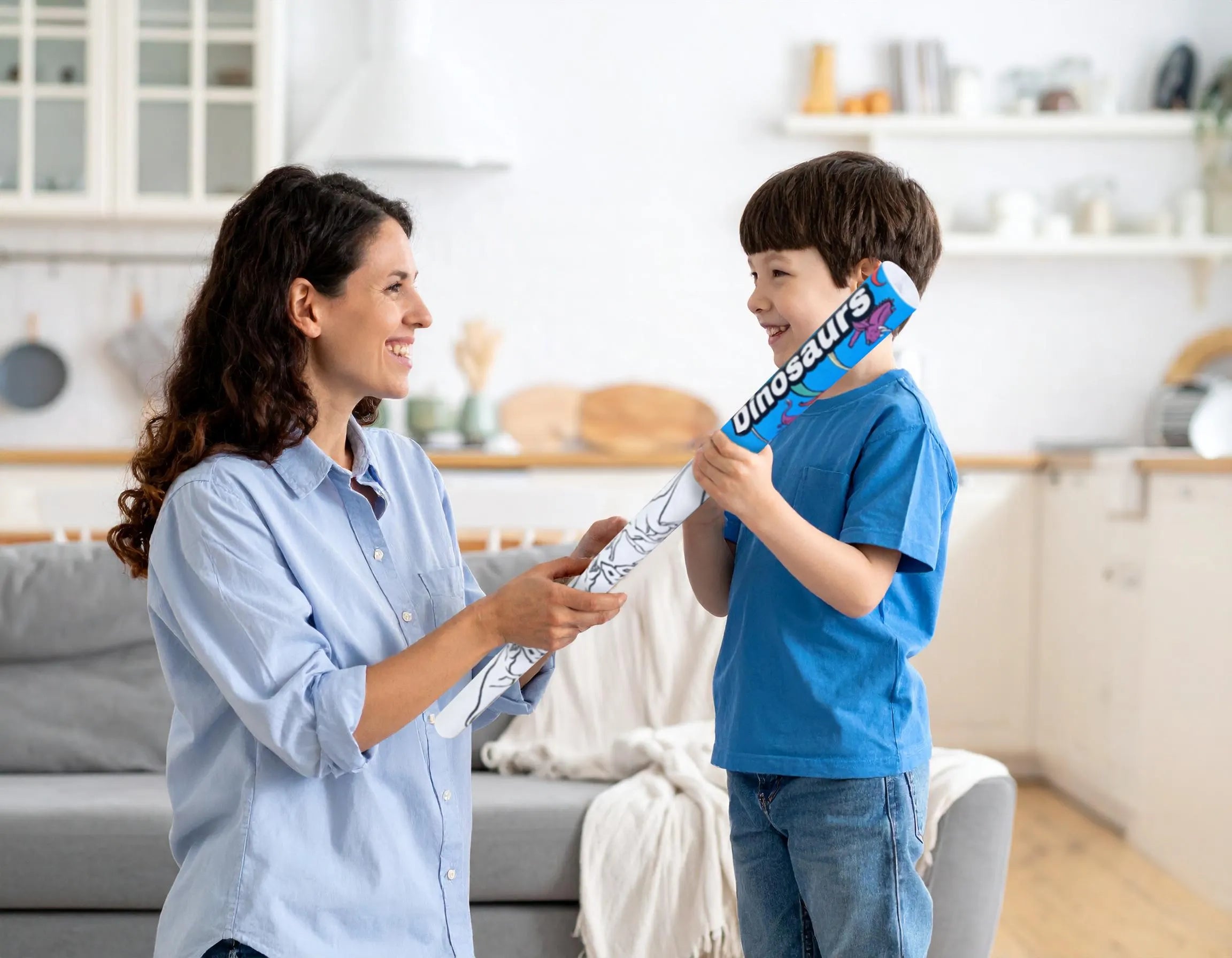 Mother giving her son a 72 inch x 36 inch giant dinosaur coloring poster.